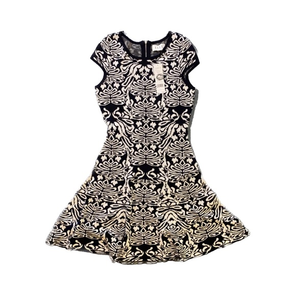 Elle Dresses & Skirts - Black and white skater sweater dress, NWT Elle XS